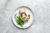 Chicken wrap with pesto and vegetables