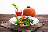 Salad with pumpkin, feta, tomato and croutons