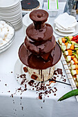 Chocolate fountain with liquid chocolate