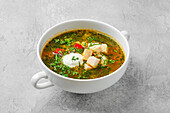 Vegetable soup with chicken fillet and sour cream