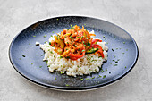 Pulled beef with peppers and courgettes on rice