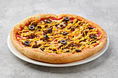 Pizza with minced beef, sweetcorn and mustard sauce