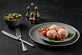 Frozen veal meatballs with tomatoes and basil