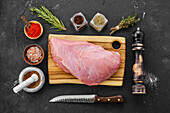 Raw turkey breast fillet with spices and herbs