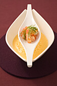 Carrot soup with crayfish and dill