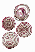 Red onion rings on a white background
