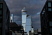 Cityscape with dramatic sky, view looking north from Chelsea neighborhood to 10 Hudson Yards and 30 Hudson Yards, New York City, New York, USA