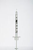 Botox syringe on white background