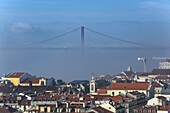 Portugal, Lisbon, The Tagus and the Ponte 25 de Abrile in the mist, seen from the Chateau Sao Jorge