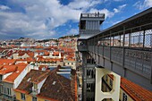 Portugal, Lisbon, Baixa district Santa Justa lift, Lisbon skyline view and Saint George Castle