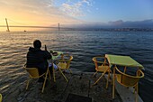 Portugal, Lisbon area, Almada, at the place called Ponto Final on the south bank of the Tagus with the 25 April bridge in the background