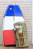 Canada, New Brunswick, Acadie, Westmorland County, Shediac (Self-proclaimed Lobster Capital of the World), Acadian flag colored boat