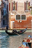 Italy, Veneto, Venice listed as World Heritage by UNESCO, Castello district, gondola and gondolier