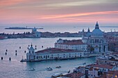 Italy, Veneto, Venice listed as World Heritage by UNESCO, San Marco district, high angle view from the campanile San Marco on Santa Maria della Salute church and Guidecca island