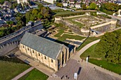 France, Calvados, Caen, the ducal castle of William the Conqueror, the Exchequer hall (salle de l'Echiquier) and the ruins of the dungeon in the background (aerial view)
