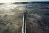 France, between Calvados and Seine Maritime, the Pont de Normandie (Normandy Bridge) at dawn, south access viaduct and Rivière-Saint-Sauveur viewed from the South Pylon