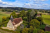 France, Orne, Pays d'Auge, Ecorches, St-Saturnin Church of the Lignerits of the twelfth century restored in the seventeenth century, Charlotte Corday (great-great-great-granddaughter of Pierre Corneille) was baptized there (aerial view)