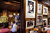 France, Seine Maritime, Rouen, place du Vieux Marché, the restaurant La Couronne in a half-timbered house from 1345 is the said to be the oldest inn in France, portrait of famous customers hanging on the walls