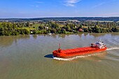 France, Seine-Maritime, Pays de Caux, Norman Seine River Meanders Regional Nature Park, the general cargo ship Merit going up the Seine at Mesnil sous Jumieges (aerial view)
