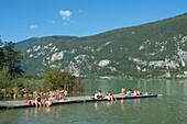 France, Savoie, Lake Aiguebelette, pontoon and beach of Novalaise and the mountain of the Epine