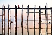 Myanmar (Burma), Mandalay region, Amarapura, the 1.2-mile-long U Bein Teak Bridge, was built in 1849 on Taungthaman Lake