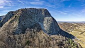 France, Puy de Dome, Orcival, Regional Natural Park of the Auvergne Volcanoes, Monts Dore, Tuiliere rock, volcanic pipe formed phonolite (aerial view)