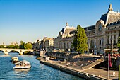 France, Paris, area listed as World Heritage by UNESCO, the banks of the Seine, a boat bus in front of the Musee d'Orsay