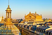France, Paris, the Opera Garnier and the cupola of the Grand Magasin le Printemps
