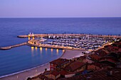 France, Alpes Maritimes, Menton, the old port, full moon evening in the spring