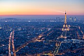 France, Paris area listed as World Heritage by UNESCO, Eiffel Tower (© SETE-illuminations Pierre Bideau) and La Defense after sunset