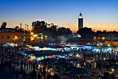 Morocco, High Atlas, Marrakech, Imperial city, Medina listed as World Heritage by UNESCO, Jemaa el-Fna square and the minaret of the Koutoubia mosque in the background