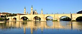 Spain, Aragon Region, Zaragoza Province, Zaragoza, Basilica de Nuestra Senora de Pilar and the Puente de Piedra on the Ebro River