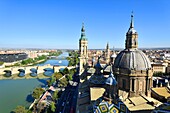 Spain, Aragon Region, Zaragoza Province, Zaragoza, Basilica de Nuestra Senora de Pilar and the Puente de Piedra on the Ebro River
