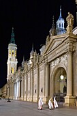 Spain, Aragon Region, Zaragoza Province, Zaragoza, Semana Santa (Holy Week) celebrations, Basilica de Nuestra Senora de Pilar in the background