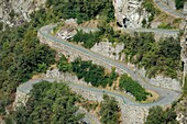 France, Savoie, Maurienne, on the largest cycling area in the world, the incredible winding Montvernier road near Saint Jean de Maurienne where regularly passes the Tour de France, general view from the belvedere under the village of Montvernier