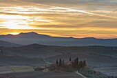 Italy, Tuscany, Val d'Orcia listed as World Heritage by UNESCO, San Quirico d'Orcia, sunrise at the place called the Belvedere