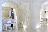 Italy, Basilicata, Matera, troglodyte old town listed as World Heritage by UNESCO, European Capital of Culture 2019, Sasso Caveoso, Aquatio hotel (Cave Luxury Hotel & Spa) designed by architect Simone Micheli and opened in 2018, restaurant The Dispensa dug into the tuff