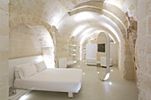 Italy, Basilicata, Matera, European Capital of Culture 2019, troglodyte old town listed as World Heritage by UNESCO, Sasso Caveoso, Aquatio hotel (Cave Luxury Hotel & Spa) designed by architect Simone Micheli and opened in 2018, more dug in the tuff