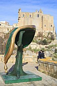 Italy, Basilicata, Matera, European Capital of Culture 2019, troglodyte old town listed as World Heritage by UNESCO, Sassi di Matera, Sasso Barisano, sculpture of Salvador Dalí with the Convent of St. Augustine (Sant'Agostino)