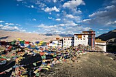 India, Jammu and Kashmir state, Himalaya, Ladakh, Indus valley, Matho monastery (gompa), flags of prayers floating in the wind, the colorful tower and the floors of the building housing the new Matho Museum