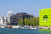 France, Rhone, Lyon, La Confluence district south of the Presqu'ile, close to the confluence of the Rhone and the Saone rivers, quai Rambaud along the former docks, Cube Vert by the architects Dominique Jakob and Brendan Mac Farlane, Rooftop 52 building and Ycone residential building designed by architect Jean Nouvel