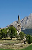 France, Alpes de Haute Provence, Ubaye massif, Saint Paul sur Ubaye, the church of Saint Paul and the Chambeyron massif