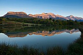 France, Isere, Trieves, Lake Marais and the reflection of the Obiou massif at sunset (2790m)