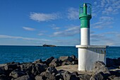 France, Herault, Agde, Cape of Agde, La Digue Lighthouse with Fort Brescou in the background