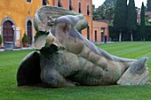 Italy, Tuscany, Pisa, Piazza dei Miracoli, listed as World Heritage by UNESCO, Bronze the fall of Icarus is the work of Igor Mitoraj