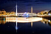 France, Seine Maritime, Le Havre, city rebuilt by Auguste Perret listed as World Heritage by UNESCO, Footbridge of the Bassin du Commerce by Guillaume Gillet (1969), Volcano of architect Oscar Niemeyer and lantern tower of Saint Joseph's church