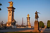 France, Paris, area listed as World Heritage by UNESCO, the Alexandre III bridge and the Eiffel Tower