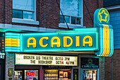 Canada, Nova Scotia, Annapolis Valley, Wolfville, Acadia Theater, neon marquee, dusk
