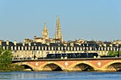 France, Gironde, Bordeaux, area listed as World Heritage by UNESCO, Pont de Pierre on the Garonne River, Pey-Berland tower and Saint Andre cathedral