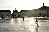 France, Gironde, Bordeaux, area listed as World Heritage by UNESCO, Saint Pierre district, Place de la Bourse, the reflecting pool from 2006 and directed by Jean-Max Llorca hydrant